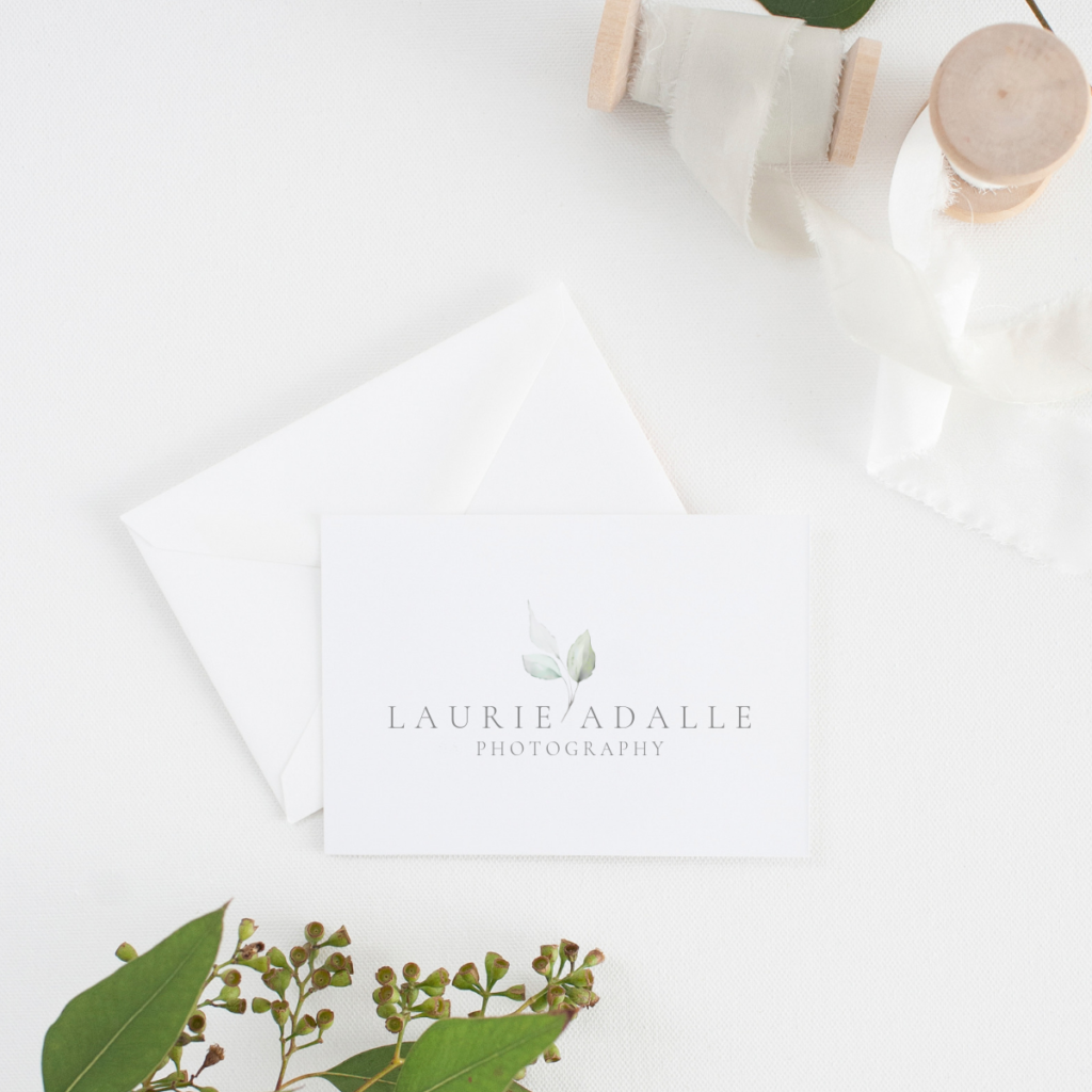 Ribbon and stationary displaying logo design